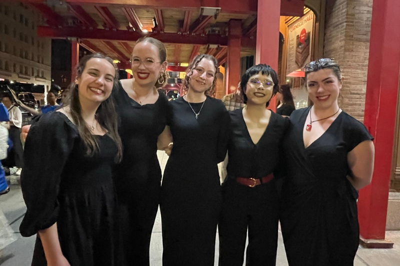 Briar Chorus singers in lobby of Carnegie Hall 